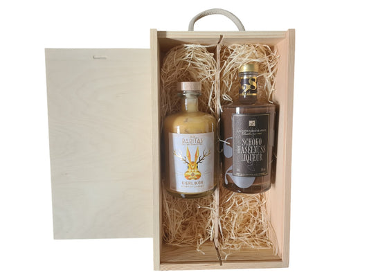 Holzbox mit Tragekordel und Schiebedeckel dazu RARITAS Eierlikör und Schoko-Haselnuss Liqueur